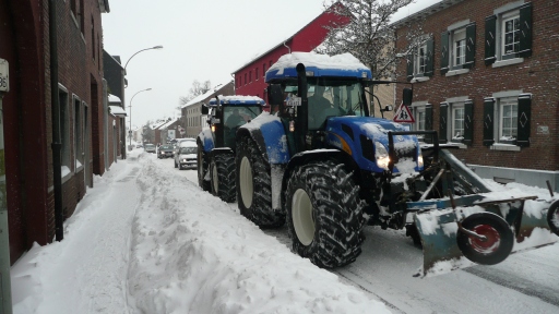 Snowy winter 2010  tractors as snowplough 